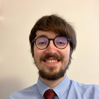 A portrait photo of Aleks Carver