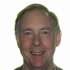 A portrait photo of David Brooks