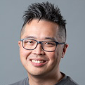 A portrait photo of Eugene Tang